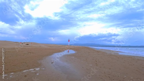 Desierto de la Playa del fangar en el delta del ebro en dirección a faro del fangar photo