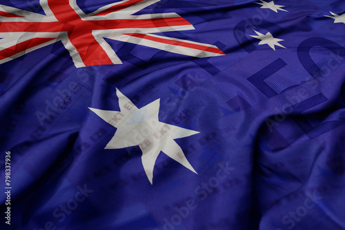 waving colorful national flag of australia on a euro money banknotes background. finance concept.