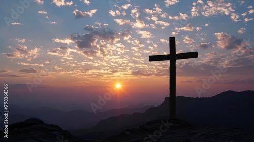 Explore the symbolic significance of a cross silhouetted against the dawn sky on a mountain peak © Khalif