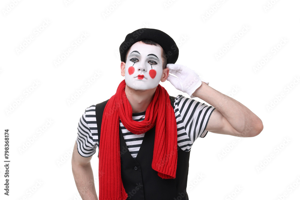 Mime artist showing hand to ear gesture on white background Mime artist showing hand to ear gesture on white background