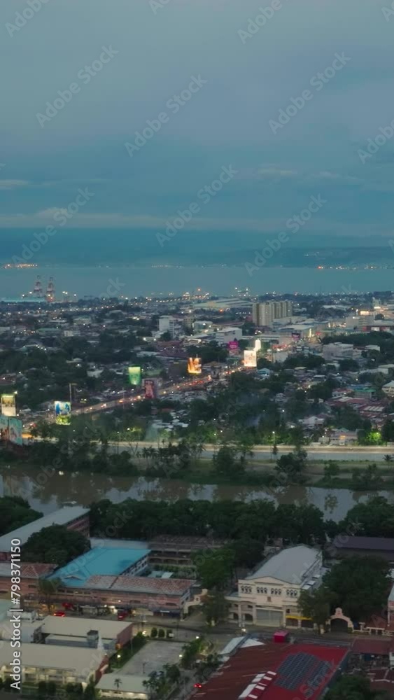 Buildings and village with lights in Cagayan de Oro. Mindanao, Philippines. Vertical video. Buildings and village with lights in Cagayan de Oro. Mindanao, Philippines. Vertical video.