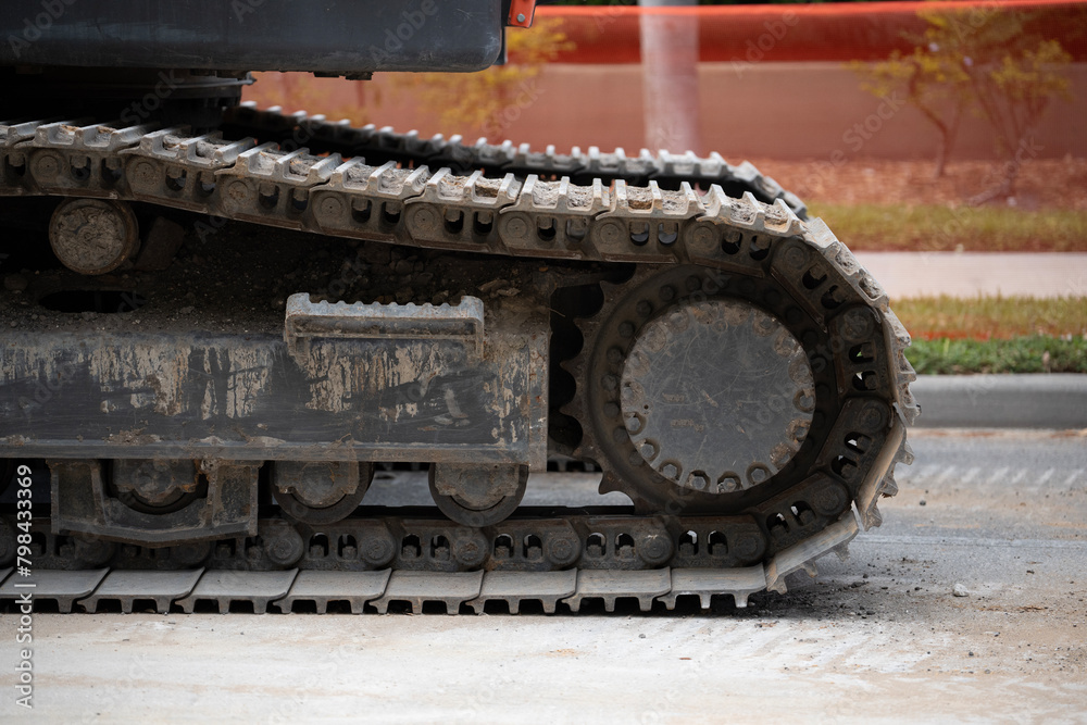 dozer wheels on a downtown consruction site