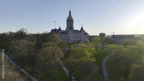 Aerial HDR footage of Statehouse building in Hartford, Connecticut. Drone video flying forwards towards the capitol building. photo