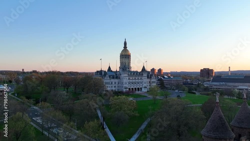 Drone video of the Connecticut State Capitol Building in Hartford, CT at dusk - Aerial view over Bushnell Park photo