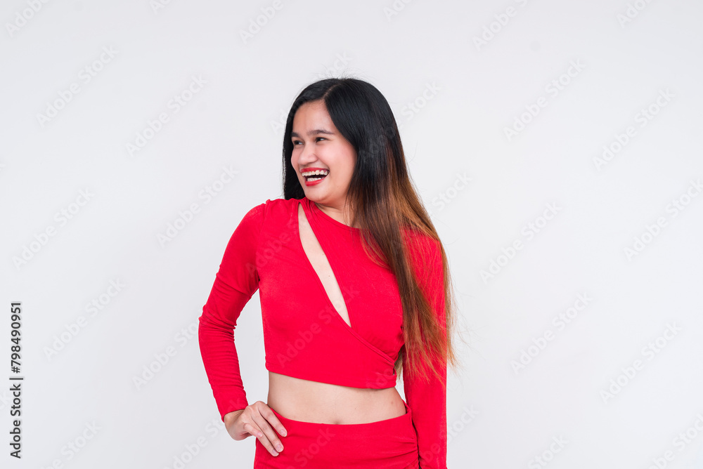 Happy Asian woman in a red dress smiling, isolated on white background Happy Asian woman in a red dress smiling, isolated on white background