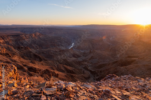 Landscape shot of the sunset over the Fish River Canyon in Southern Namibia. photo