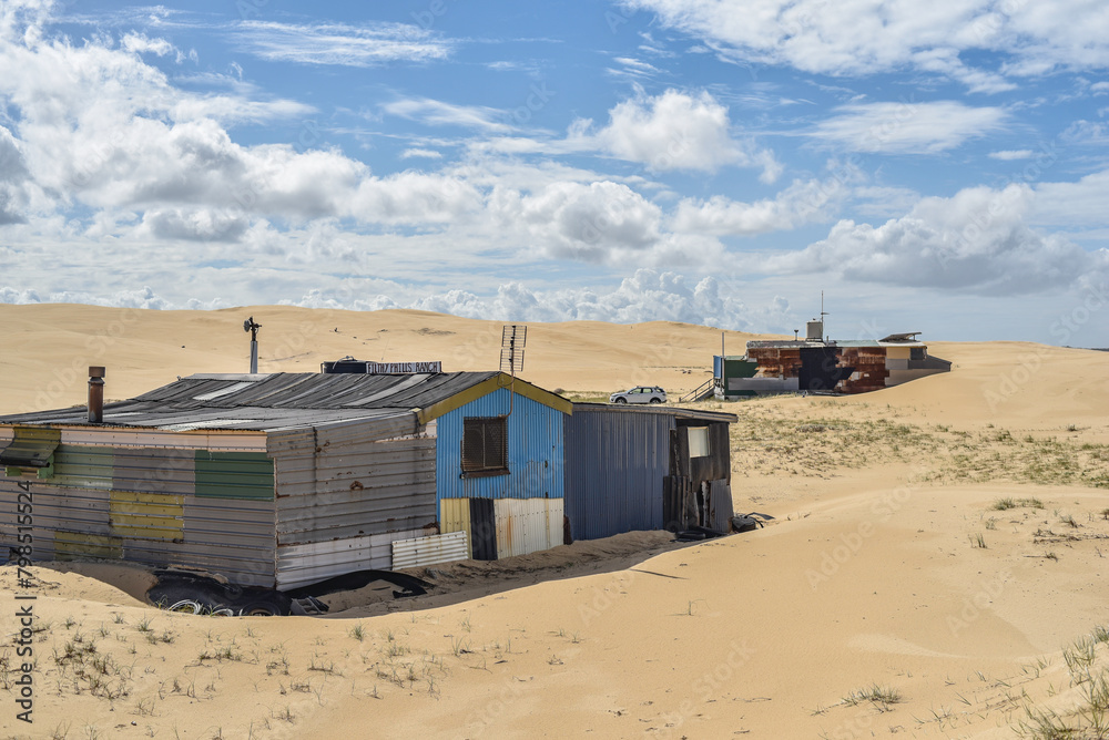 Walk through the sand dunes to Tin City Walk through the sand dunes to Tin City