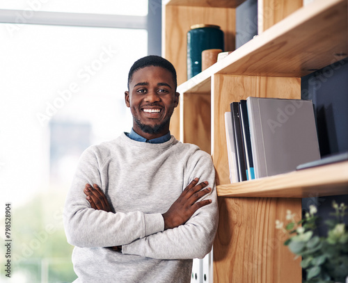 Foto Portrait, black man and confident with smile in office for startup company, junior employee or intern