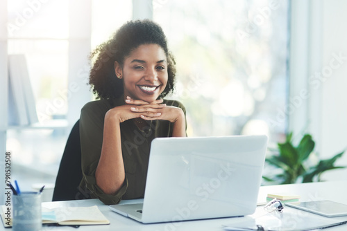 Business, portrait and happy woman with laptop in office for research, planning or case study at law firm. Legal, help and friendly lawyer with paperwork for idea, notes or compliance documents photo