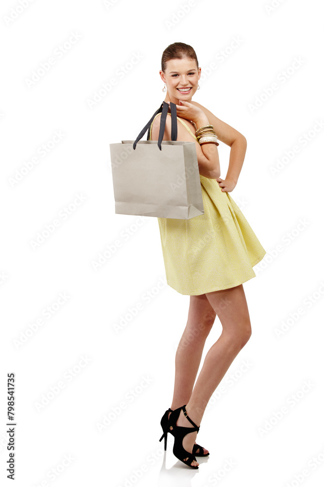 Woman, shopping bag and fashion in studio with discount, package and gift for spring sale on a white background. Portrait of excited person, customer or model with retail, present and luxury in heels Woman, shopping bag and fashion in studio with discount, package and gift for spring sale on a white background. Portrait of excited person, customer or model with retail, present and luxury in heels