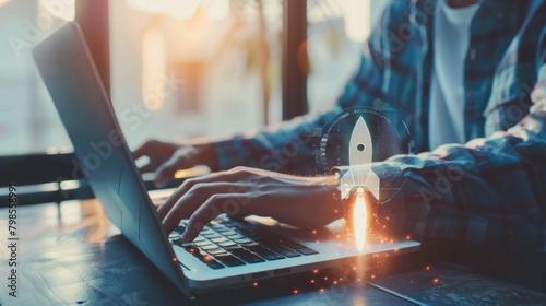 Businessgirl uses laptop with virtual rocket icon and up arrow, symbolizing startup success through strategic planning. photo