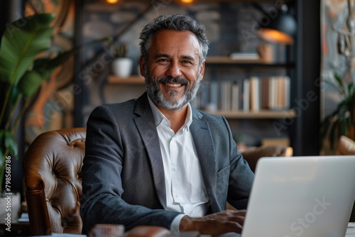 smiling mature adult business man executive sitting at desk using laptop  mid aged businessman ceo manager working on computer corporate technology in  Generative AI