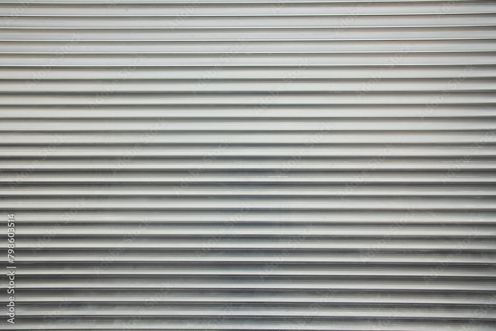 Rolled Steel Shutter Door Texture Background . Horizontal shot