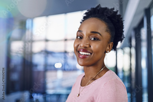Business  portrait and happy black woman in lobby with confidence  smile and positive attitude. Pride  face or African intern at consulting agency for learning  opportunity or future career growth