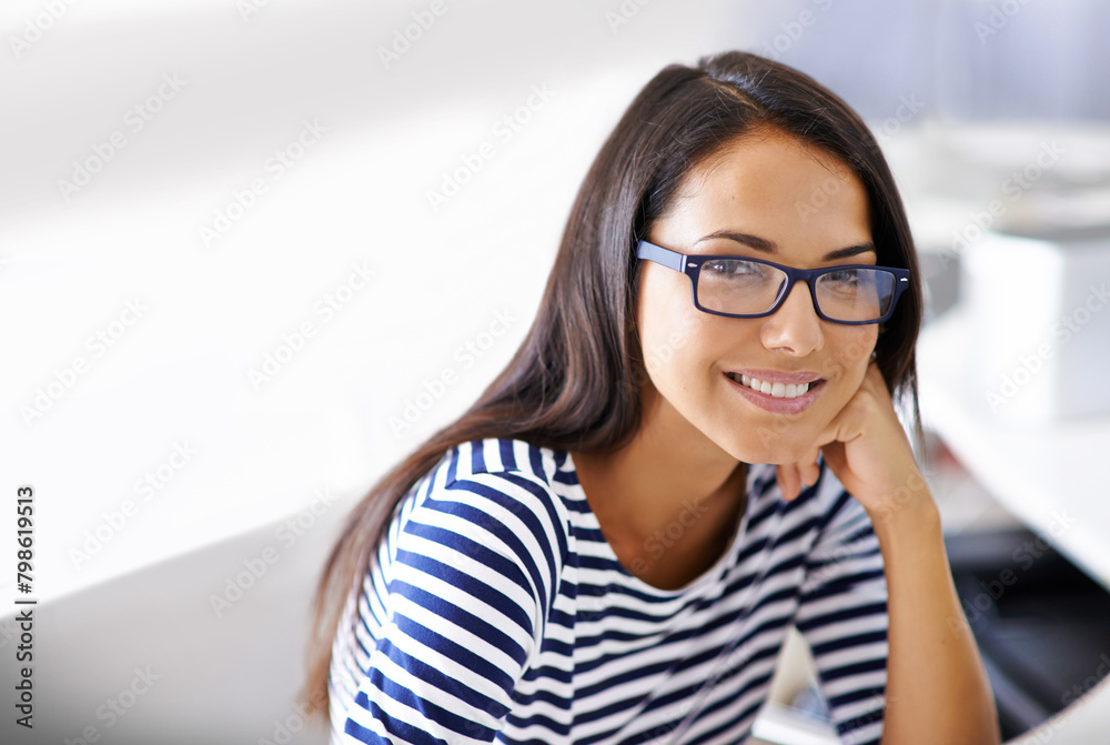 Professional, portrait and creative woman in office with happiness and productivity on project. Person, smile and receptionist relax with confidence and pride in Australia for work in administration