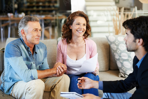 Mature couple, broker and documents in house for mortgage for retirement in planning, finances and advice. Man, woman and consultant for pension, deal or agreement in lounge with advisor in home