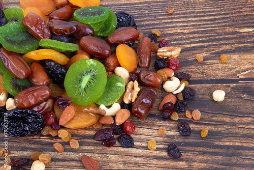 Fototapeta Naklejka Na Ścianę i Meble -  Dry fruits on wood