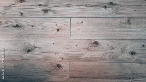 Wood-coloured laminate flooring - an interesting background photo