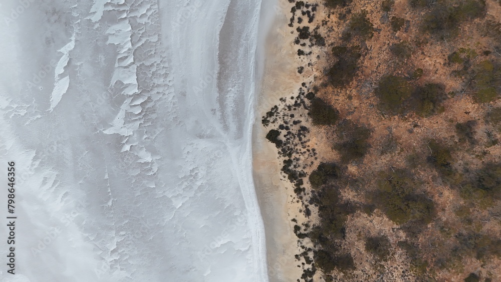 Straight down aerial view of a salt lake and the bush in Western Australia