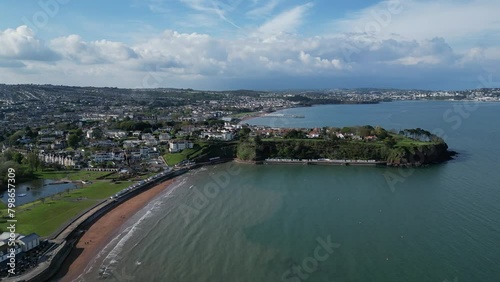 Goodrington Sands, Torbay, South Devon, England: DRONE VIEWS: The drone flies towards Roundham Head giving distant views of Paignton Pier. Torbay is a popular UK holiday destination (2). photo