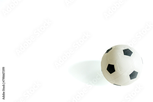 rubber soccer ball in isolated white background with light shadow. full rubber toy.