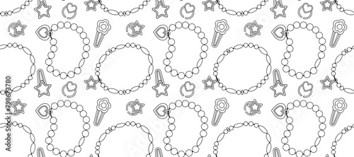 Pattern of kids jewelry on white background. Beads bracelets, ring, earrings,hairpin in black and white seamless pattern.