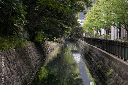 The Gardens of Hamarikyu are a public park in Ch      Tokyo  Japan. Located at the mouth of the Sumida River they are surrounded by modern buildings.