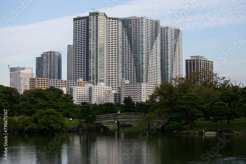The Gardens of Hamarikyu are a public park in Ch      Tokyo  Japan. Located at the mouth of the Sumida River they are surrounded by modern buildings.
