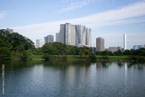 The Gardens of Hamarikyu are a public park in Ch      Tokyo  Japan. Located at the mouth of the Sumida River they are surrounded by modern buildings.