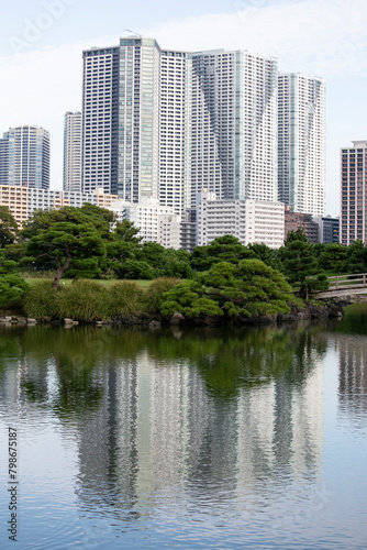 The Gardens of Hamarikyu are a public park in Chūō, Tokyo, Japan. Located at the mouth of the Sumida River they are surrounded by modern buildings. © Leckerstudio