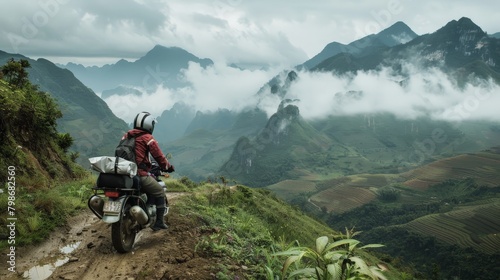 A young explorer navigating the rugged terrain on a motorbike in northern Vietnam