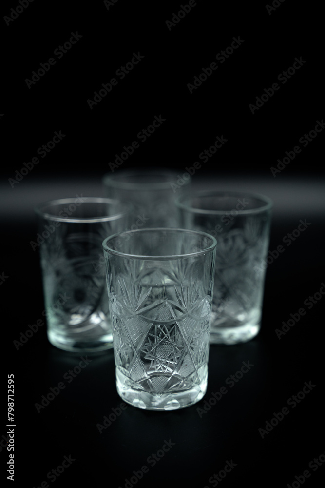 glass of water on black background close up glass of water on black background close up