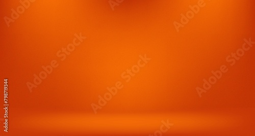 Orange photographic studio background vertical with soft vignette. Soft gradient background. Painted canvas studio backdrop. photo