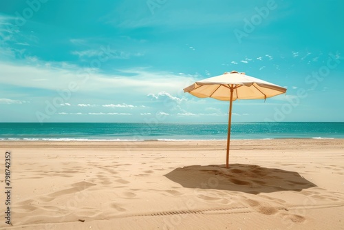 Beach Sand Background. Quiet and Uncrowded Beach with Umbrella Travel Tour Tourism photo