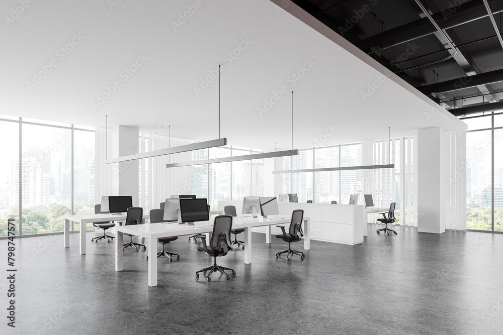 Fototapeta premium Modern workplace interior with pc monitors on desks in row, panoramic window