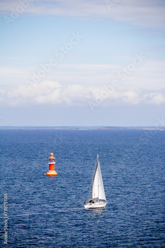 Lonley sailboat in the sea heading towards the unknown. Finnish archipelago