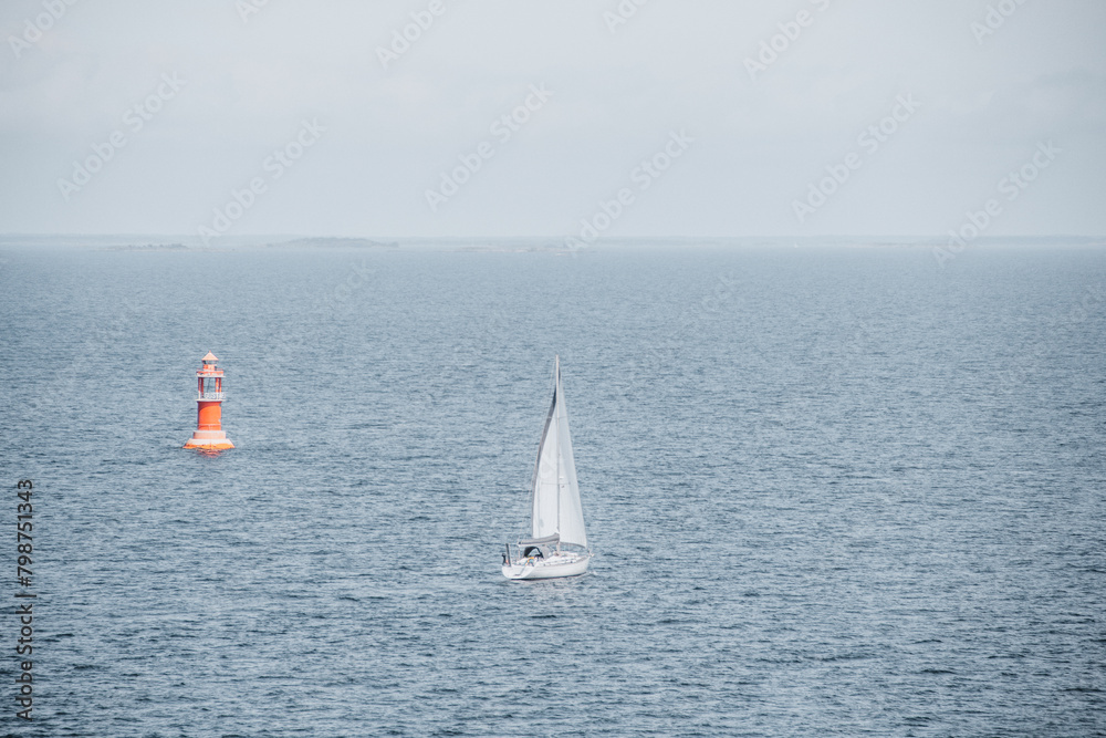 Lonley sailboat in the sea heading towards the unknown. Finnish archipelago