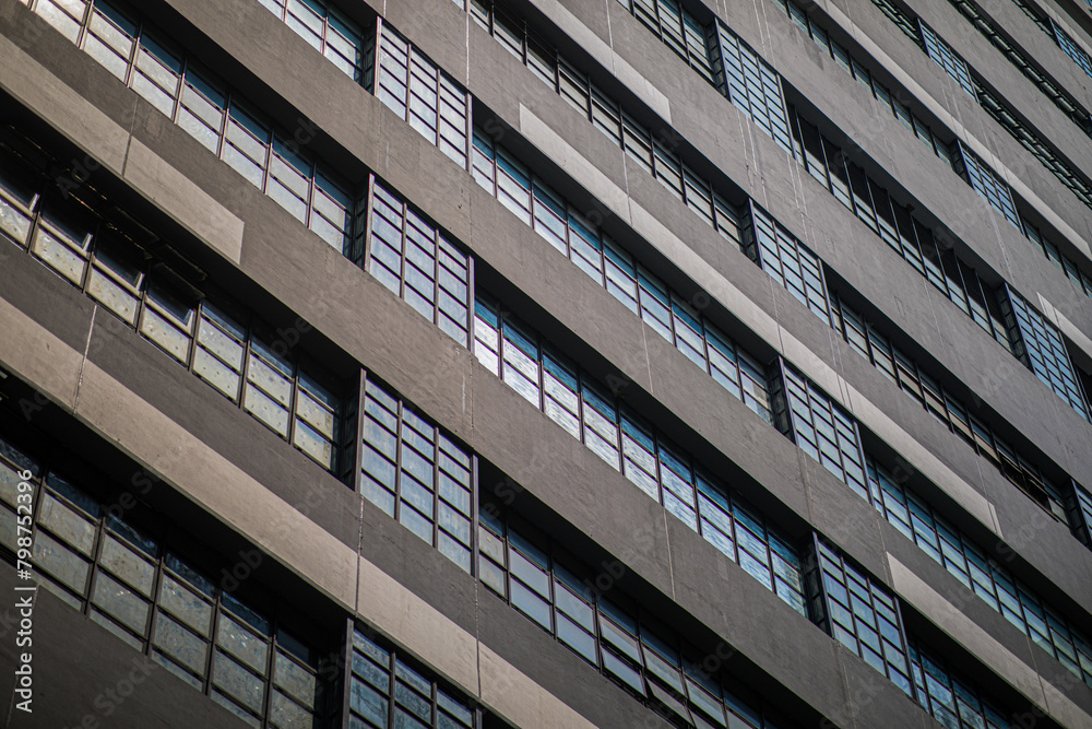 Close-up view of a contemporary building with white-framed windows