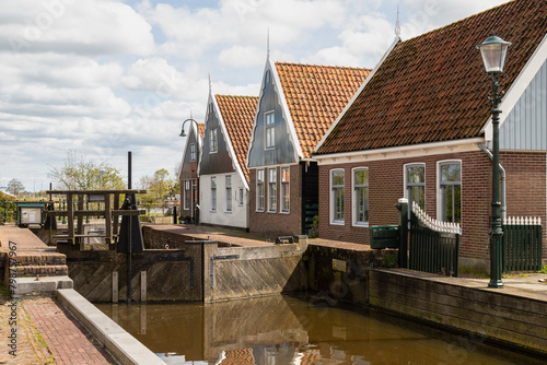 Fototapeta Naklejka Na Ścianę i Meble -  Lock in the picturesque small Dutch village West-Graftdijk.