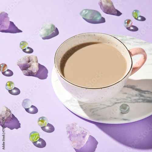 cup of coffee with purple cristals photo