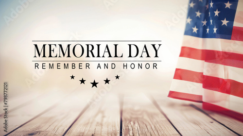 Warm-toned Memorial Day banner with a soft focus American flag and wooden plank backdrop photo