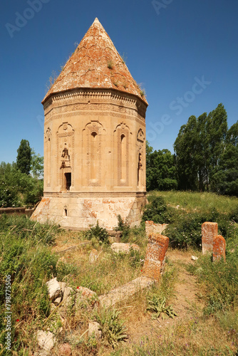 Overgrown trail lined by tombstones leading to the Halime Hatun tomb, grave, mausoleum, Halime Hatun Kümbeti, close to Lake Van, Van Gölü, Gevas, Turkey photo