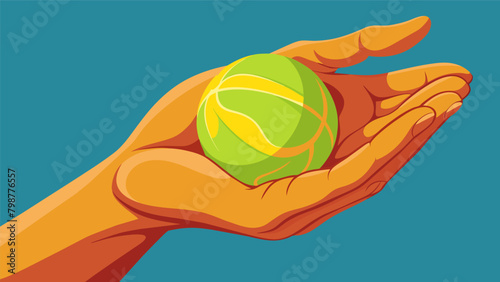 Closeup of a hand gripping a tennis ball the muscles visibly loosening as the ball presses against them providing a deep tissue massage experience..