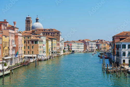 View of the gondolas of the Grand Canal on a sunny day in Venice, Italy photo