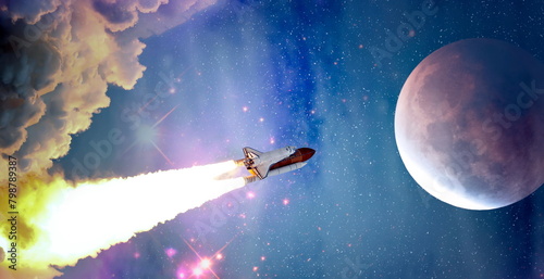 Fototapeta Naklejka Na Ścianę i Meble -  rockets launch into space on the starry sky. spacecraft flies into space with clouds of smoke. Elements of this image furnished by NASA