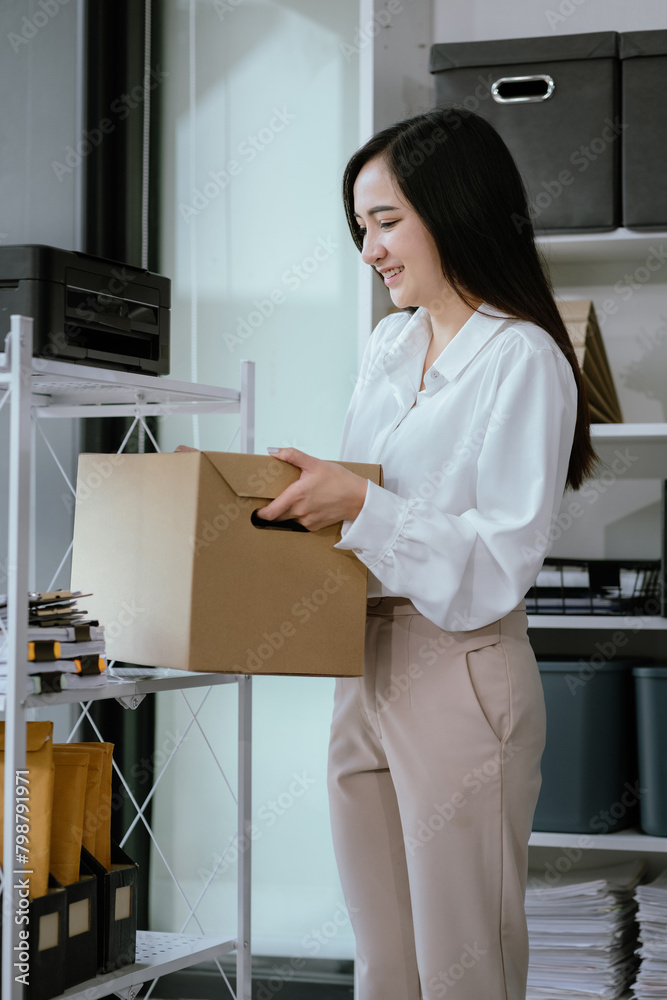 Successful business woman, excited young woman packing up in office, job promotion concept, happy working. Successful business woman, excited young woman packing up in office, job promotion concept, happy working.