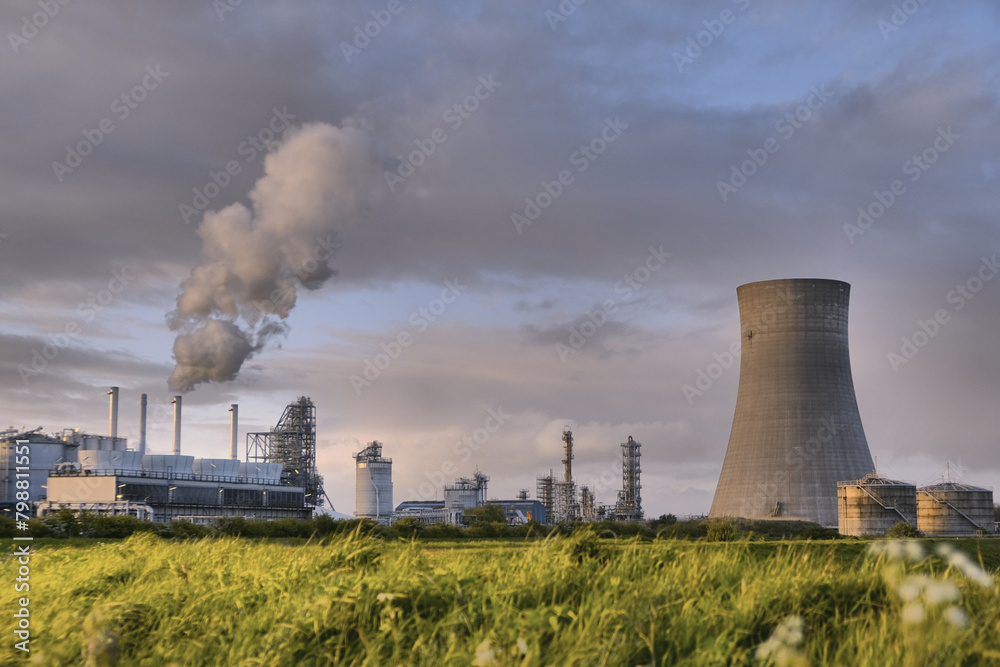 HDR Oil refinery, cooling towers, with smoke. HDR Oil refinery, cooling towers, with smoke.