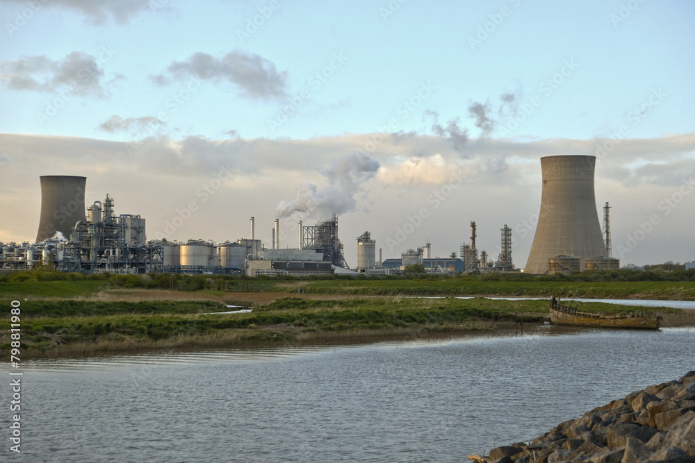 HDR Oil refinery, cooling towers, with smoke. HDR Oil refinery, cooling towers, with smoke.