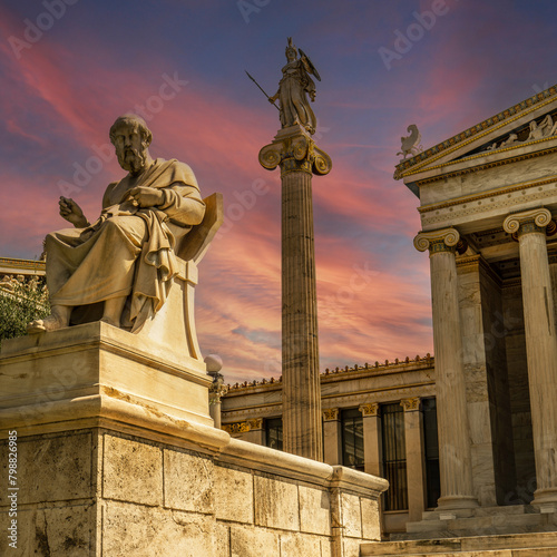 Plato the ancient Greek philosopher and Athena goddess marble statues, in front of the Athens national university. Cultural travel in Greece.