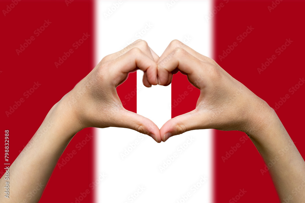Obraz premium Peru flag with two hands heart shape, express love or affection concept, support or donate to Peru